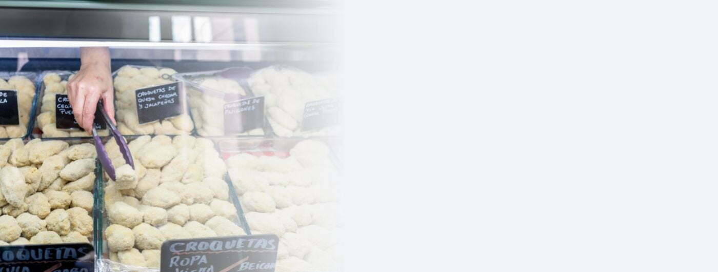 Image depicts a refrigerated display case.