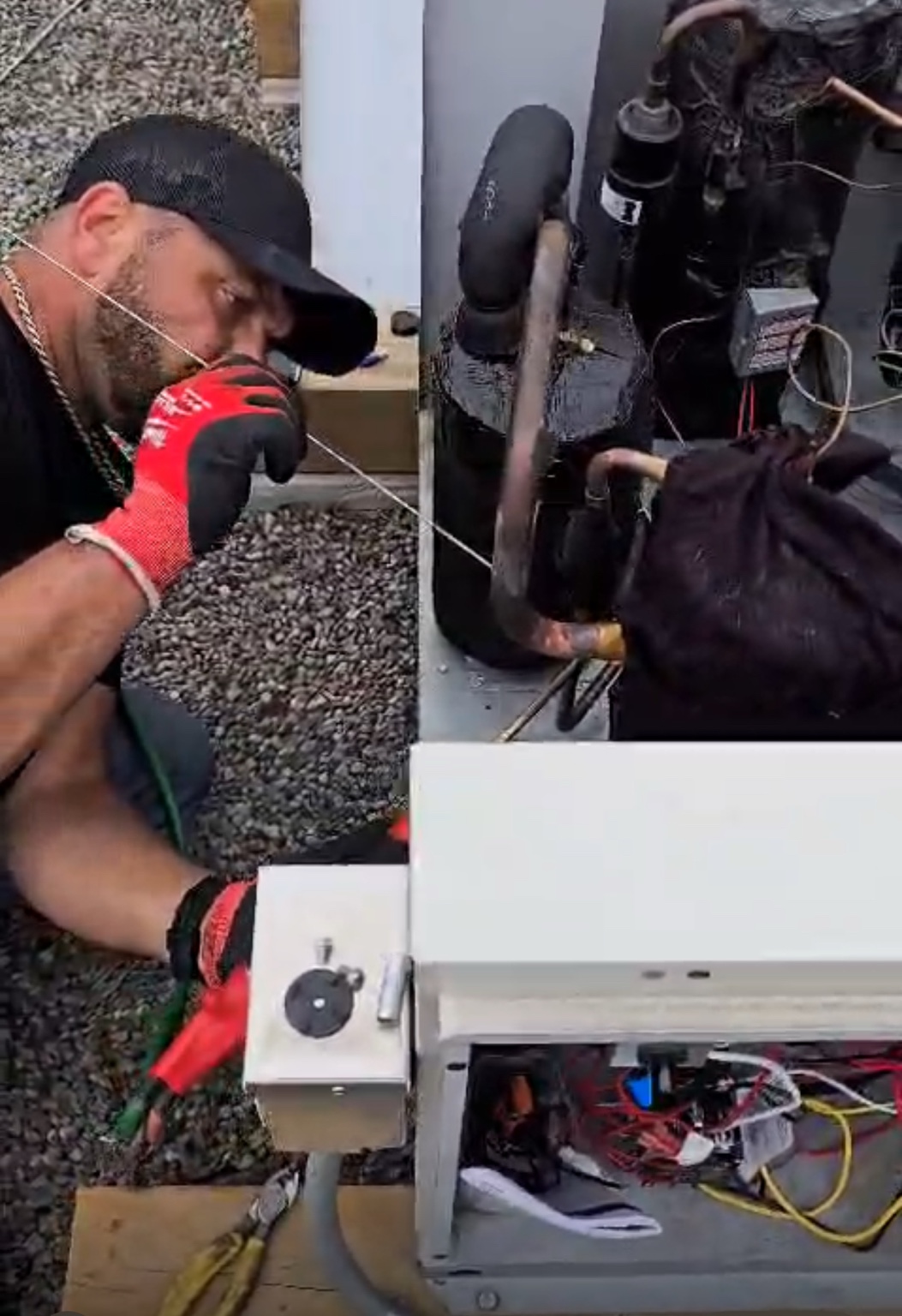 technician servicing commercial refrigeration unit