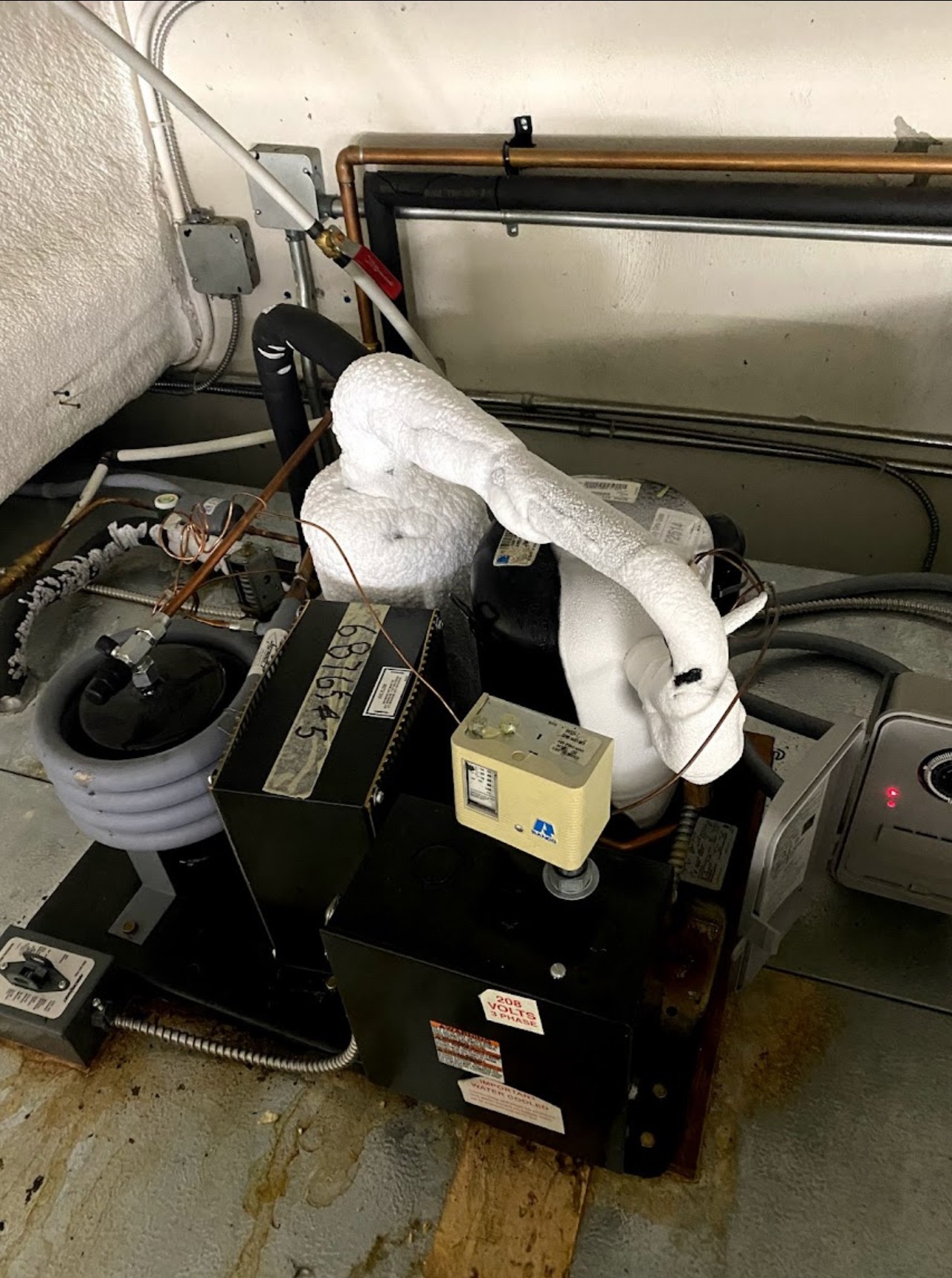 Frozen commercial refrigeration compressor inspected by CooperFix