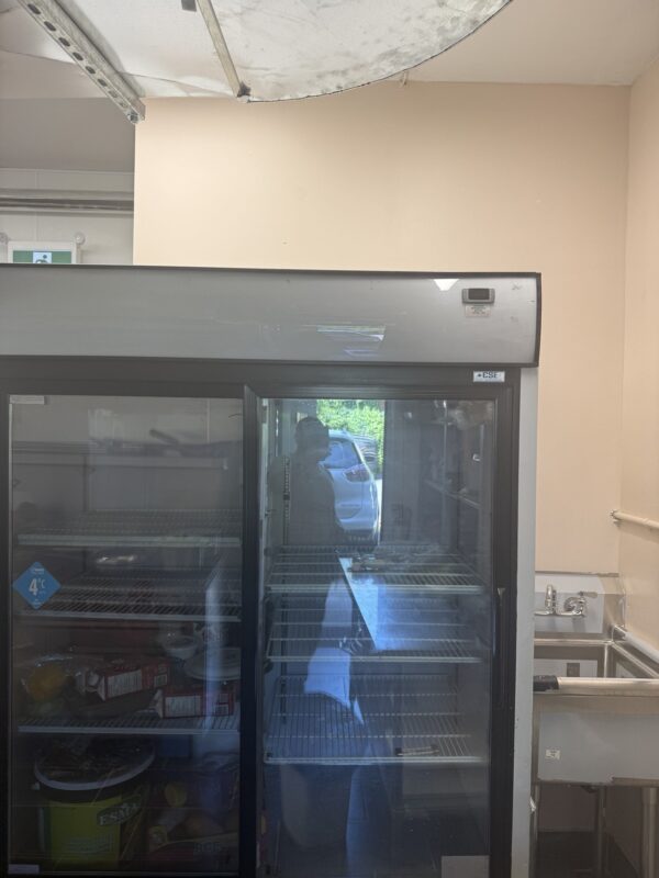 Glass-door commercial merchandiser on site
