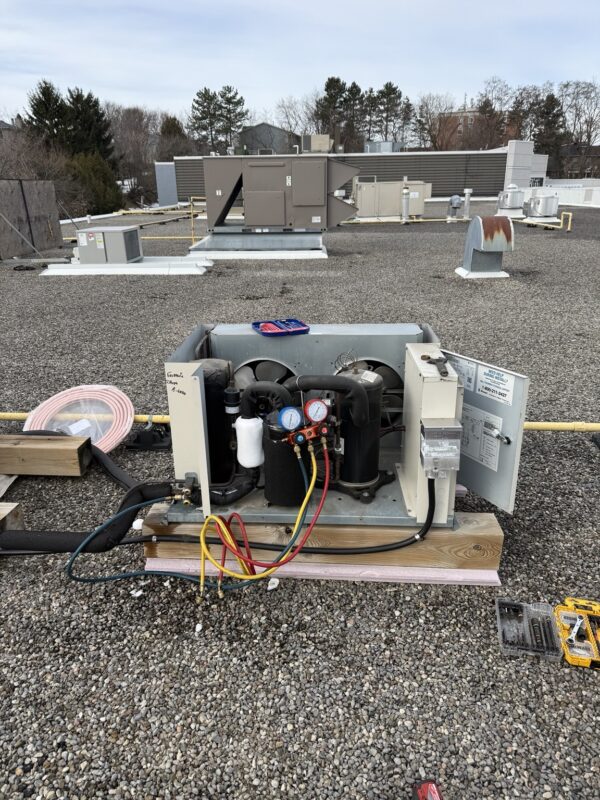 Rooftop refrigeration unit on a pallet during installation