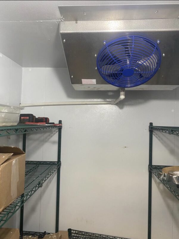 Evaporator with fan in a walk-in cooler