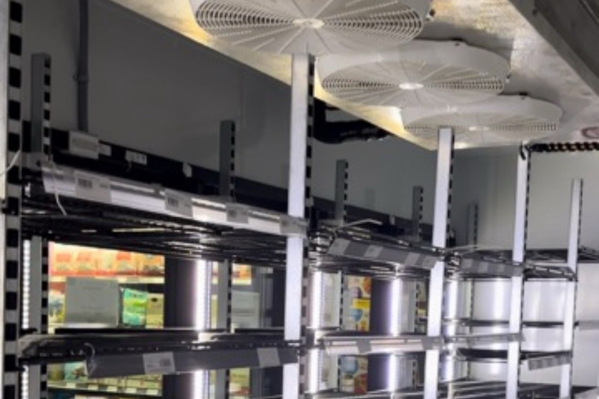 CooperFix walk-in cooler evaporator fans above stocked shelving