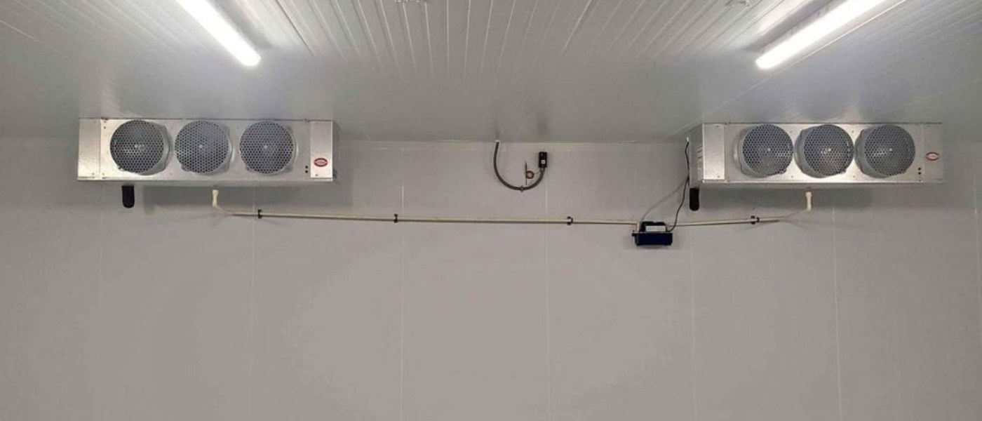 Ceiling evaporators inside a commercial walk-in cooler serviced by CooperFix in the GTA