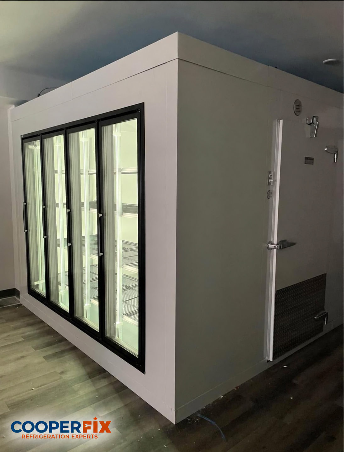 Finished commercial walk-in cooler with glass display doors