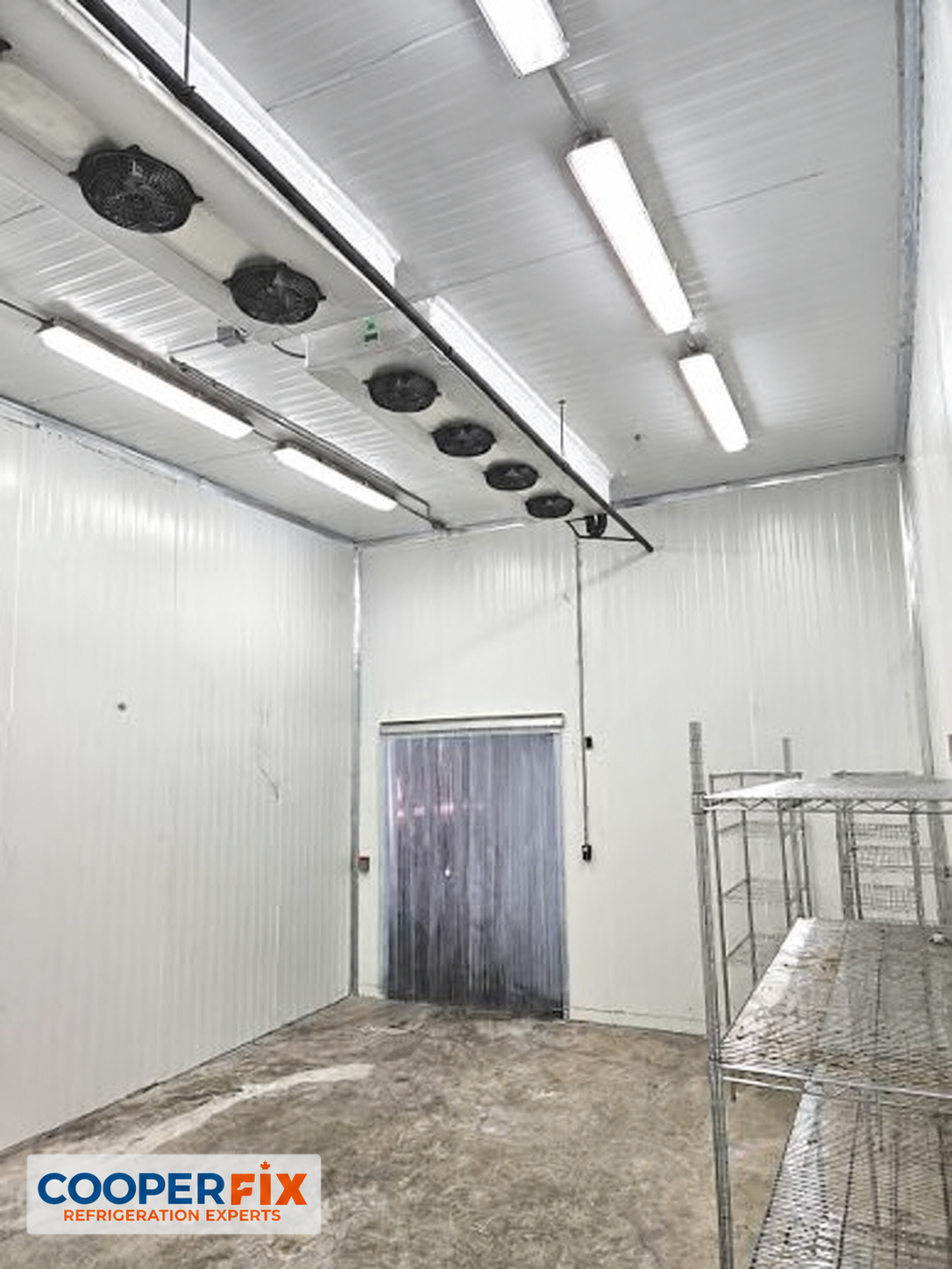 Refrigerated storage room with ceiling-mounted evaporator units