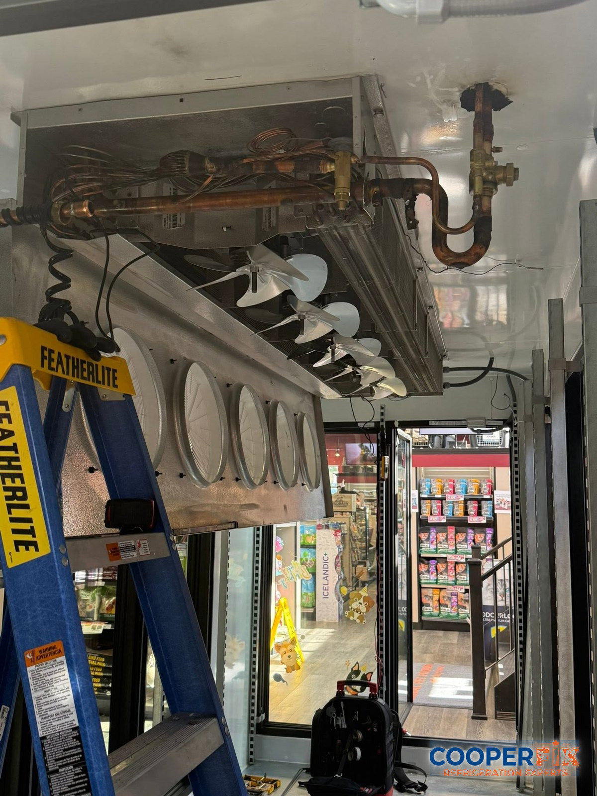 Display refrigerator evaporator opened for commercial refrigeration service