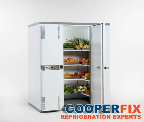 Equipment illustration of a small cold room with an open door and stored produce.
