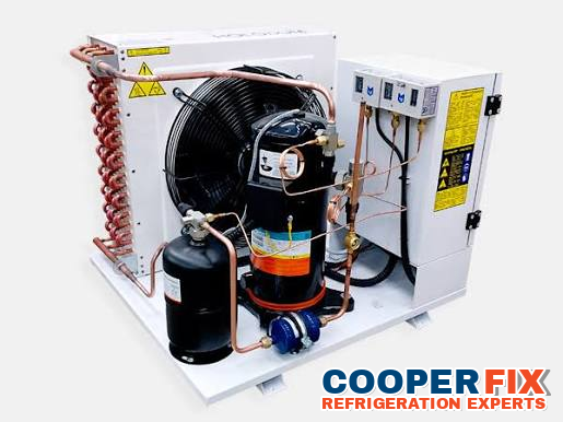 Compact commercial refrigeration compressor and condenser assembly.