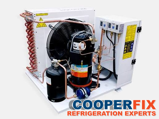 Refrigeration condensing unit with a compressor, fan and connected controls.