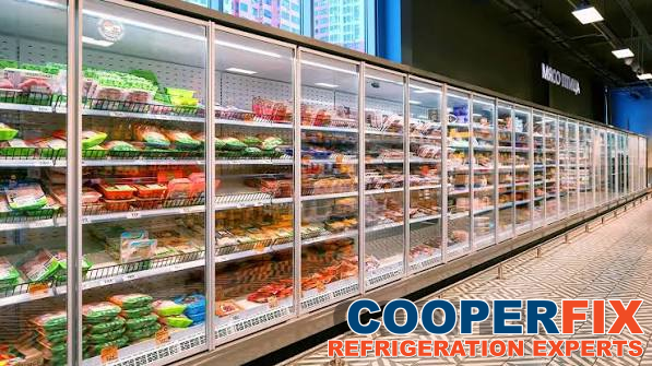 Extended open-front refrigerated food display.