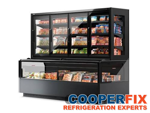 Commercial frozen-food merchandiser with glass-door and open display sections.