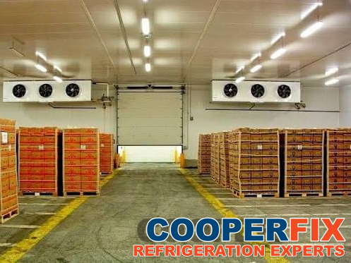 Commercial cold-storage warehouse with twin ceiling evaporators.