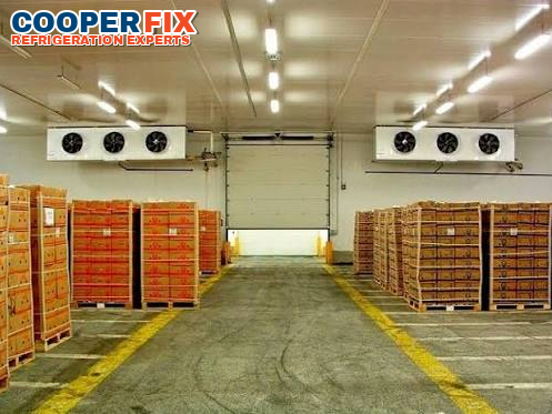 Commercial cold-storage warehouse with twin ceiling evaporators.
