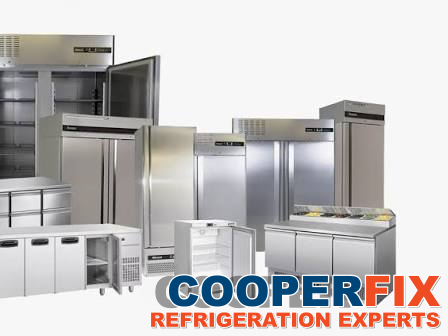 Stainless commercial reach-in refrigerators and refrigerated preparation counters.