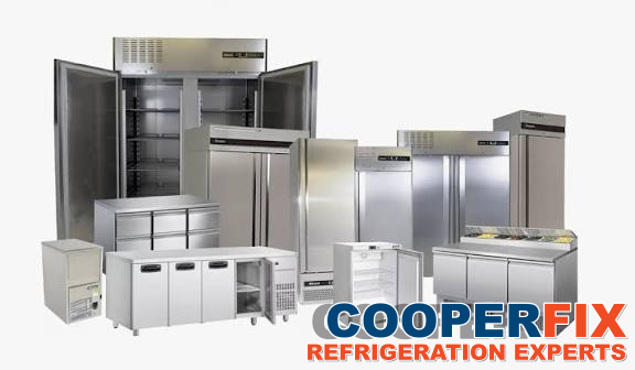 Equipment illustration showing commercial upright cabinets and refrigerated work tables.