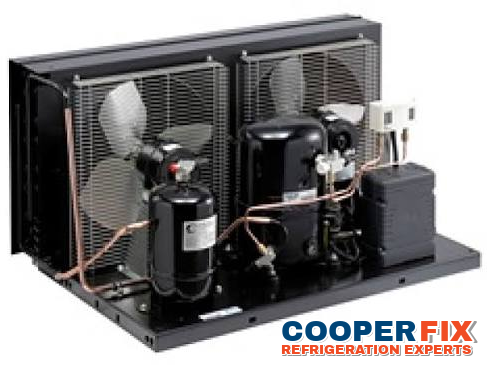 Commercial refrigeration condensing unit with two compressors.